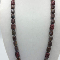 "Burnt Prayers." Very rare binghamite & antique carved red nephrite mala necklace on green silk.