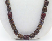 "Burnt Prayers." PRICE REDUCED Very rare binghamite & antique carved red nephrite mala necklace on green silk.