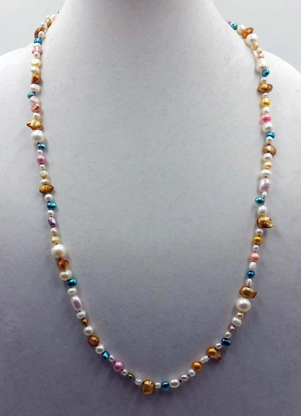 Opera length 32", multi-color, Baroque pearl necklace, adjustable sterling silver clasp. Master hand-knotting with purple silk.