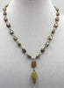 Onyx pendant on 3-tone pearl & sterling silver necklace on grey silk. 19" Princess
