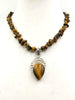 Sterling silver and tiger's eye pendant necklace. 16"-18" Choker/Princess length.