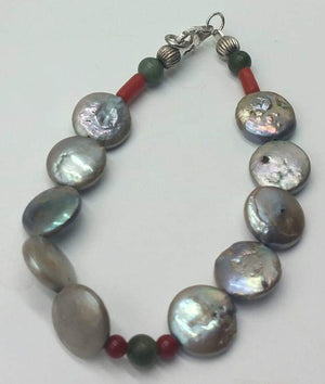 Past Work. Freshwater pearl, coral, nephrite, sterling silver bracelet. Sold.