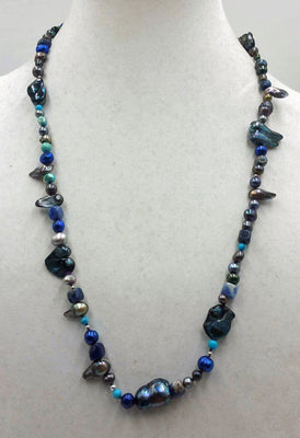Black, blue, silver pearls, sodalite, turquoise with sterling silver accents.  26
