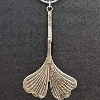 Sterling silver ginkgo leaf pendant necklace.