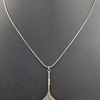 Sterling silver ginkgo leaf pendant necklace.