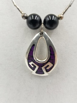 Liquid Sterling silver, onyx & enamel Thunderbird pendant necklace. Opera length, 28