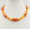 2-tone orange & peach coral, sterling silver toggle necklace. 18.75" Length.
