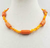 2-tone orange & peach coral, sterling silver toggle necklace. 18.75" Length.