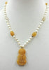 10KYG, jadeite, pearl, & 10KYG necklace on chocolate silk.