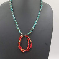 Adjustable sterling, turquoise, howlite, Navajo style necklace, coral pendant. 23-26" Matinee length.