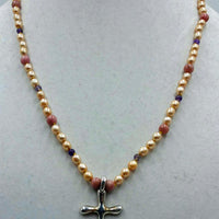 Cross necklace made of pearls & amethyst & sterling silver.