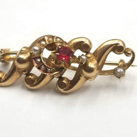 14KYG brooch with Pearl's and synthetic ruby.