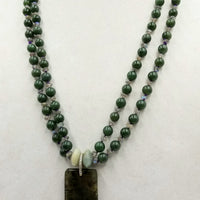Two strand jadeite, labradorite,14KYG, diamond necklace hand-knotted on purple silk.
