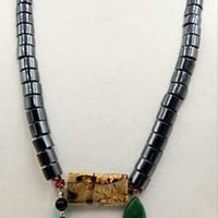 "Cave of Wonders" Bold! Hematite, agate, dyed quartz, onyx, howlite sterling accent necklace on raspberry silk. 32" Opera Length