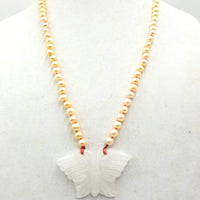 Icy white jadeite butterfly & golden pearl necklace with hand-knotted crimson silk. 25" length.