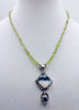 For the forest fairy mod. Peridot, dendritic glass, agate, & sterling silver pendant necklace. Vegan.