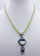 For the forest fairy mod. Peridot, dendritic glass, agate, & sterling silver pendant necklace. Vegan.