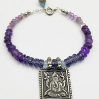 PRICE REDUCED Adjustable bracelet, with amethyst, iolite, ganesh bracelet. Swarovski.