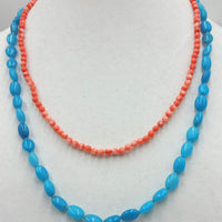 Two strand blue quartz and peach coral sterling toggle necklace on pink and grey silk. 20 in Matenee
