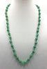 Opera length.  aventurine necklace with sterling accents and clasp on verde silk. 29.5" Opera length.