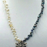 Past Work. Marcasite pendant with bi-tone pearl necklace and sterling silver clasp. Sold