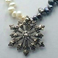 Past Work. Marcasite pendant with bi-tone pearl necklace and sterling silver clasp. Sold