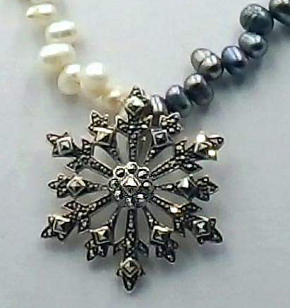 Past Work. Marcasite pendant with bi-tone pearl necklace and sterling silver clasp. Sold
