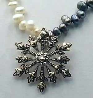 Past Work. Marcasite pendant with bi-tone pearl necklace and sterling silver clasp. Sold