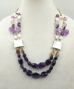 Wild, bold, gorgeous, two-strand amethyst, pearl, shell, & sterling silver necklace. If interested, please contact us.