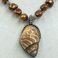 Past Works. Bronze pearl shell pendant, labradorite, & sterling silver necklace on dove grey silk. Sold.