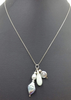 Past Works. Pearls, jadeite sterling silver triple charms necklace. Sold.