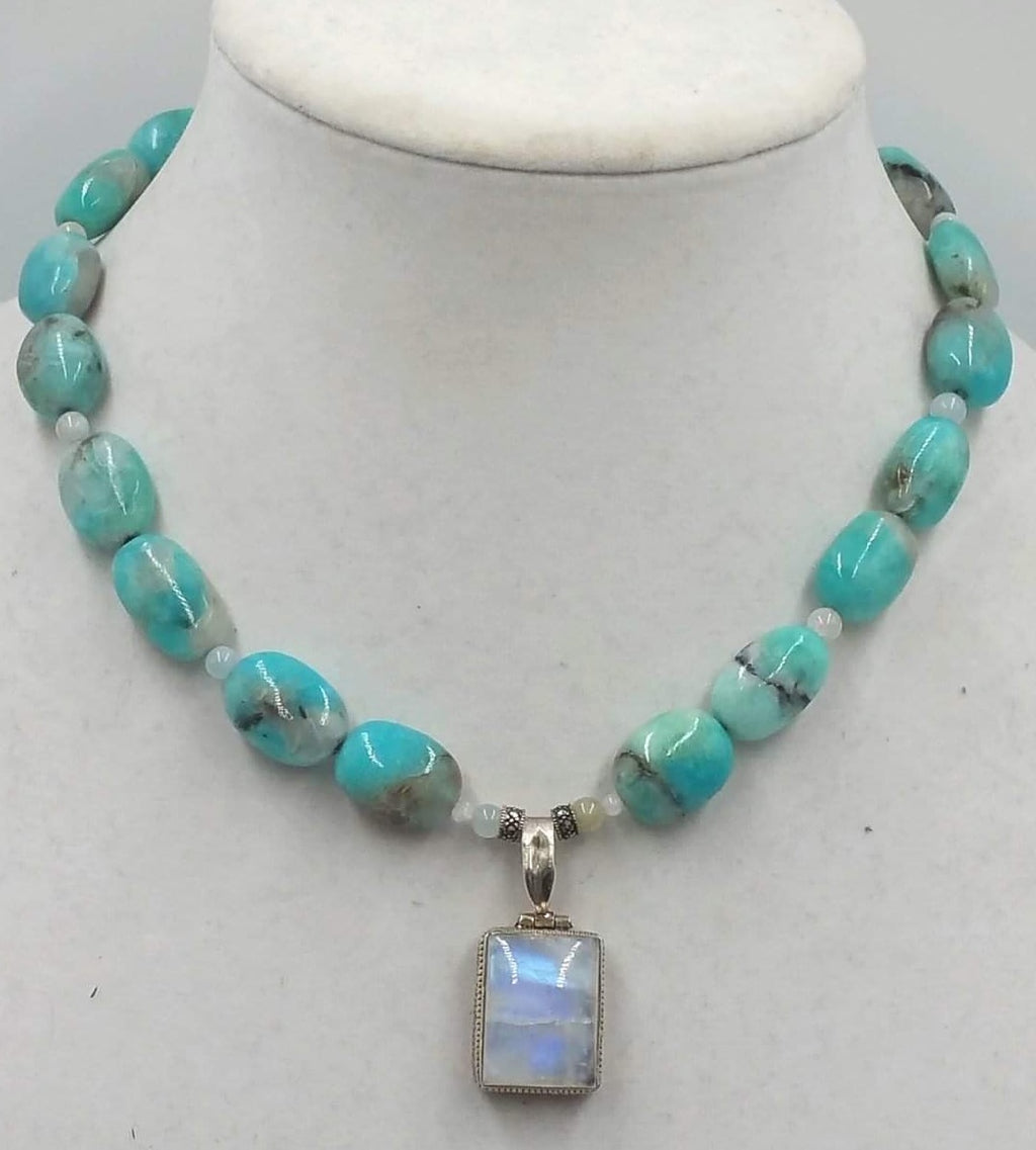 Past Work. Vibrant kiwi agate, morganite, aquamarine, and moonstone sterling silver pendant necklace. Sold