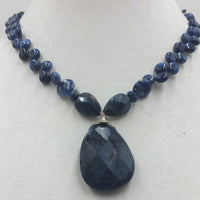 Sodalite and sterling silver pendant necklace.