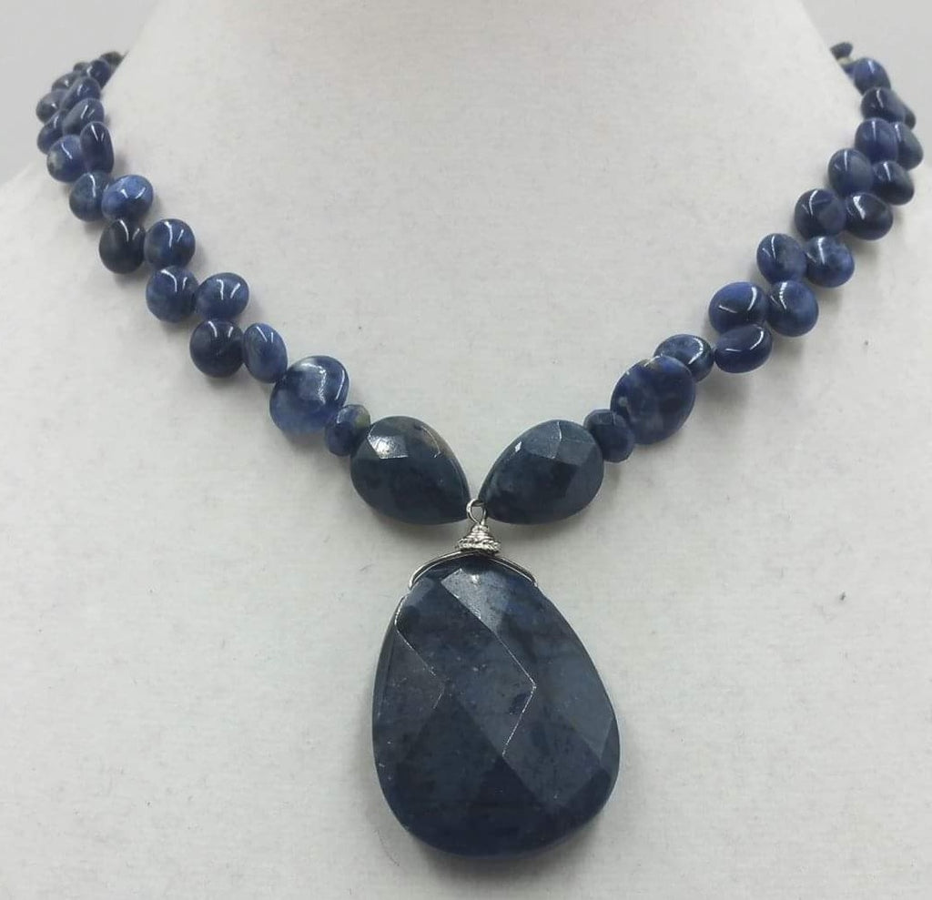 Sodalite and sterling silver pendant necklace.