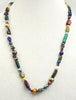 Cosmic necklace, hand-knotted. With pearls, garnets, jasper, etc. 25" Matinee length.