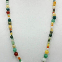 Jadeite jade, light green silk, asymmetrical necklace.