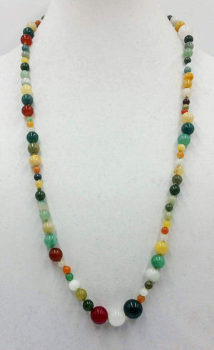 Jadeite jade, light green silk, asymmetrical necklace.