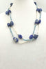 Ultra long art deco inspired freshwater cultured pearls, lapis lazuli, and sterling silver necklace.