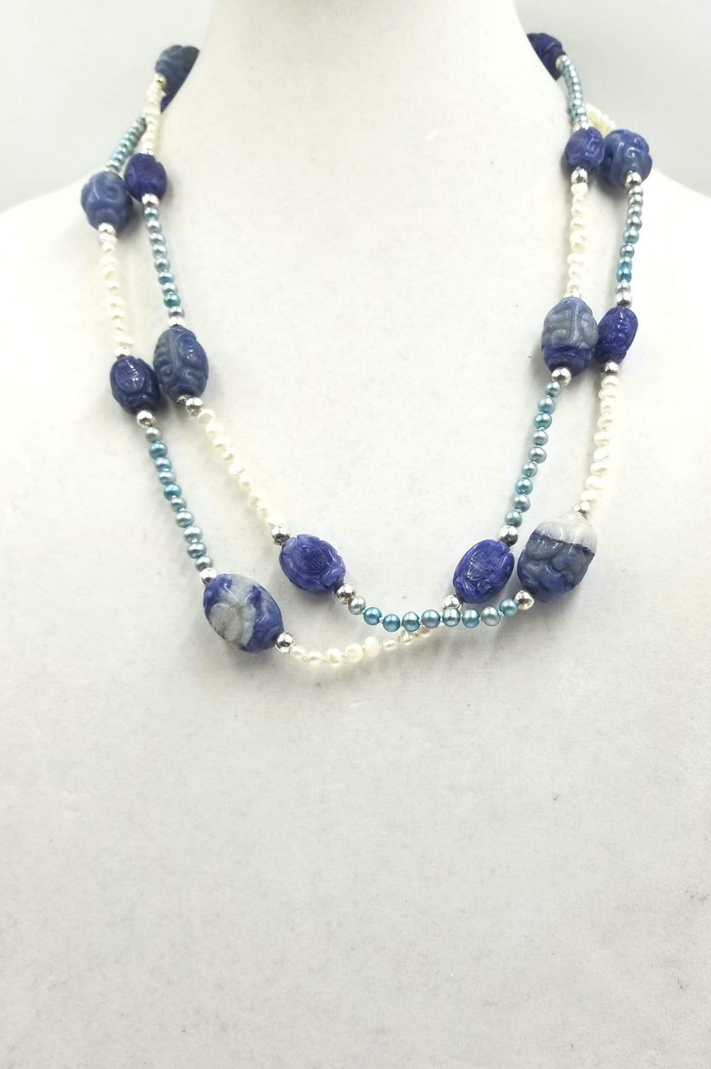 Ultra long art deco inspired freshwater cultured pearls, lapis lazuli, and sterling silver necklace.