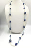 Ultra long art deco inspired freshwater cultured pearls, lapis lazuli, and sterling silver necklace.