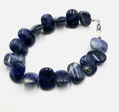 Past Work. If you love blue this is for you! Sodalite bracelet, with sterling silver clasp. 6 7/8