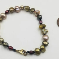 Unisex plus size multi-color pearl bracelet hand with gold fill clasp.  7.75" Length
