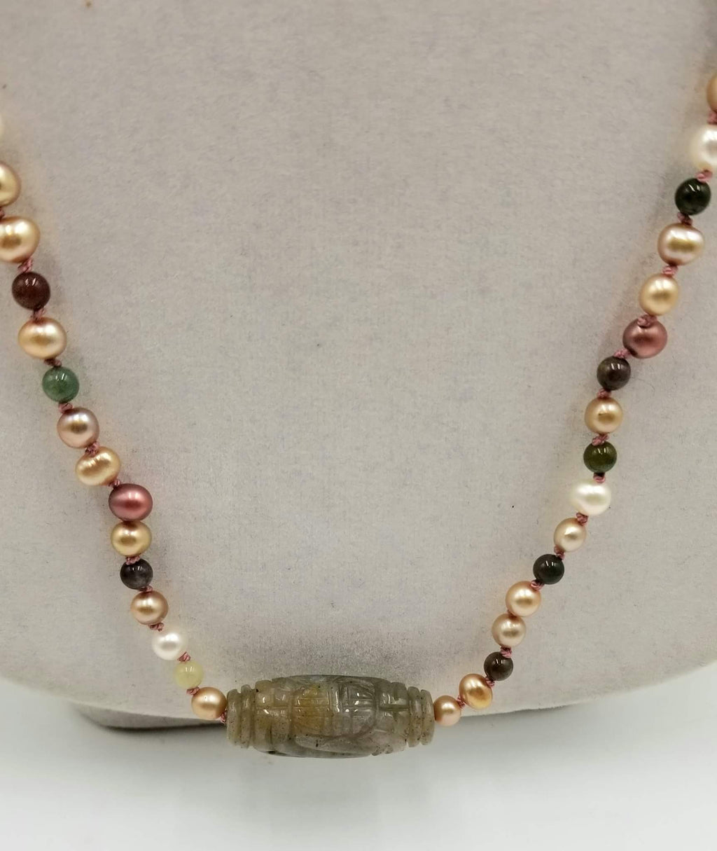 Multi-color pearls & Indian agates, with sterling silver clasp. 39" Rope length.