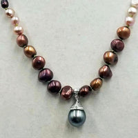 Gorgeous, coppery pearls! Ombre multi-colored fresh-water cultured pearls & sterling silver pendant. 22" length.