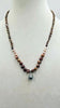 Gorgeous, coppery pearls! Ombre multi-colored fresh-water cultured pearls & sterling silver pendant. 22" length.