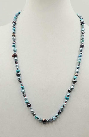 Past Work. Beautiful multi-color fresh-water cultured pearls on hand-knotted crimson silk. 28" length. Sold.