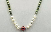 Gorgeous. Fresh-water, cultured pearls, sterling silver necklace, hand-knotted with lavender silk. 26" length.