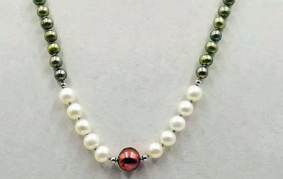 Gorgeous. Fresh-water, cultured pearls, sterling silver necklace, hand-knotted with lavender silk. 26
