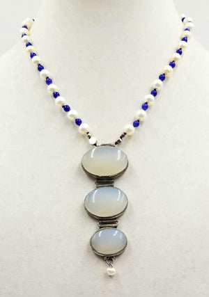A devine pendant necklace of pearls, blue aventurine & chalcedony.19" length.