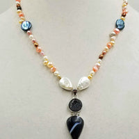 Subtle & Bold. Unique pendant necklace of pearls & agate, hand-knotted with golden silk.